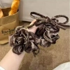 Korean-style pink velvet rose bow flower large intestine hair band, high-end bun hair accessory and hair tie Application Scenario